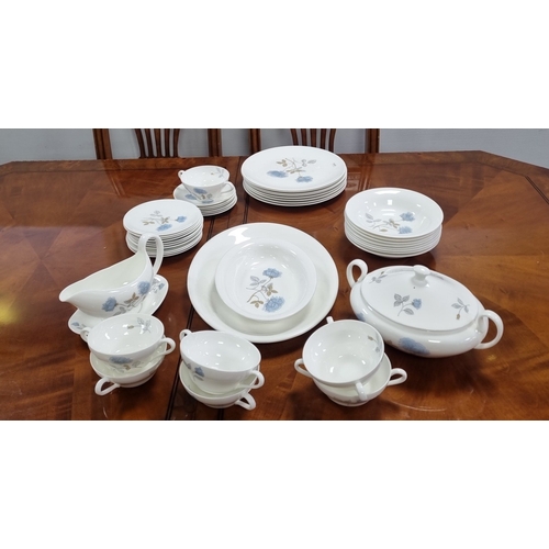 78 - Part Wedgwood bone china dinner service, blue rose pattern