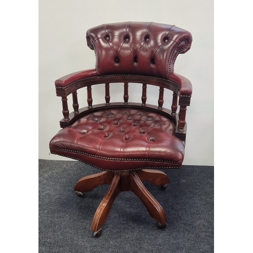 16 - Chesterfield-style  Burgundy leather swivel captains/desk chair, H: 66cm X W: 60cm X D: 39cm.