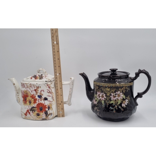 19 - Pair of decorative ceramic teapots, H: 18cm.