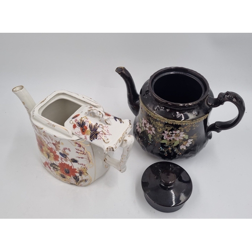 19 - Pair of decorative ceramic teapots, H: 18cm.