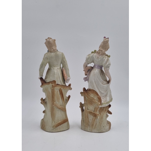 20 - Pair of porcelain figural statues, H: 24cm.