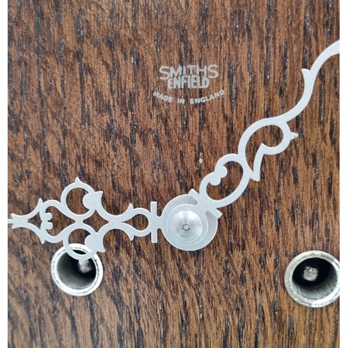 22 - Smiths Enfield oak mantel clock, H: 24cm.