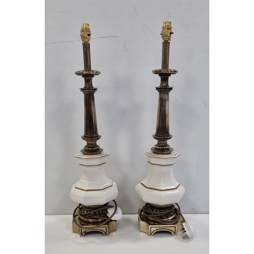 55 - Pair of bronzed metal and white ceramic table lamps, H: 70cm X W: 18cm.