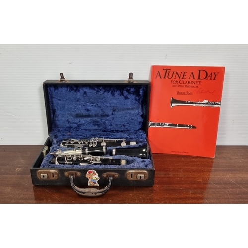 69 - Clarinet with Case, Reeds and Tutor Book