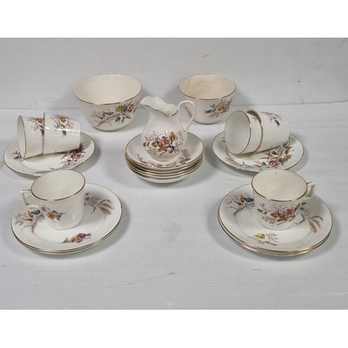 84 - Floral porcelain tea wares with gilt rims, registration mark R 43503