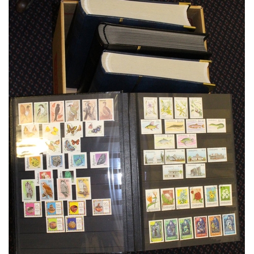 111 - BRITISH COMMONWEALTH collection housed in four large stock books, mainly QEII M or UM plus odd KGVI ... 