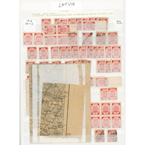 171 - LATVIA extensive duplicated range in two stock books from first issue to 1940's. (many 100's)