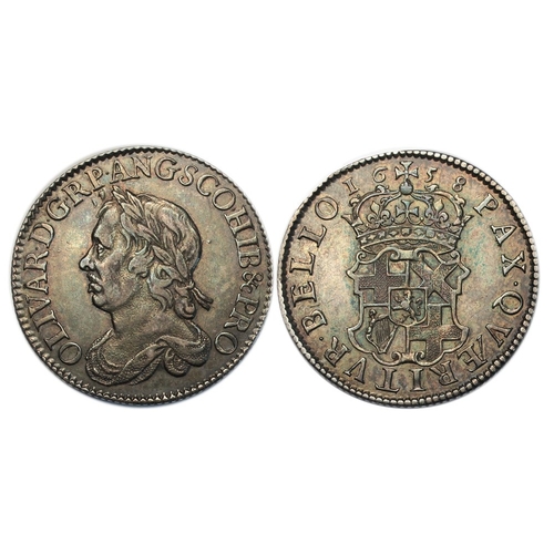 511 - 1658 shilling, a strong GVF with attractive 'rainbow' toning. A quite choice coin for the grade. S32... 