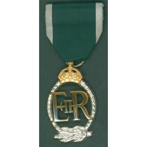 67 - Royal Navy Reserve Decoration, Eliz II dated 1973, in box. GEF.