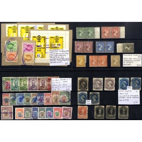 107 - BRITISH COMMONWEALTH Ex-Dealers M & U ranges on 156 black stock cards in a shoe box, ST.Cat. £12,460... 