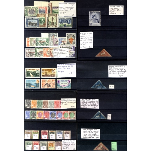 107 - BRITISH COMMONWEALTH Ex-Dealers M & U ranges on 156 black stock cards in a shoe box, ST.Cat. £12,460... 