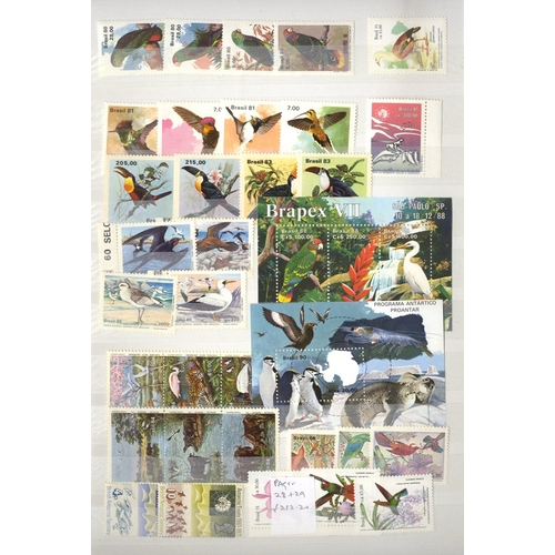 146 - BIRDS extensive collection housed in four large stockbooks A-Z ranges of stamps & miniature sheets a... 