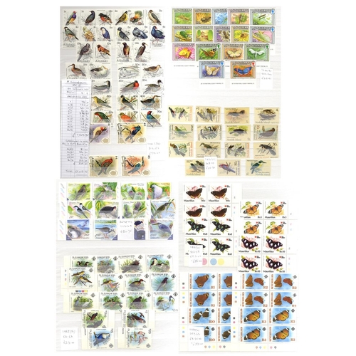 131 - BRITISH COMMONWEALTH QEII UM ranges of sets housed in a stock book, all tagged with dates & catalogu... 