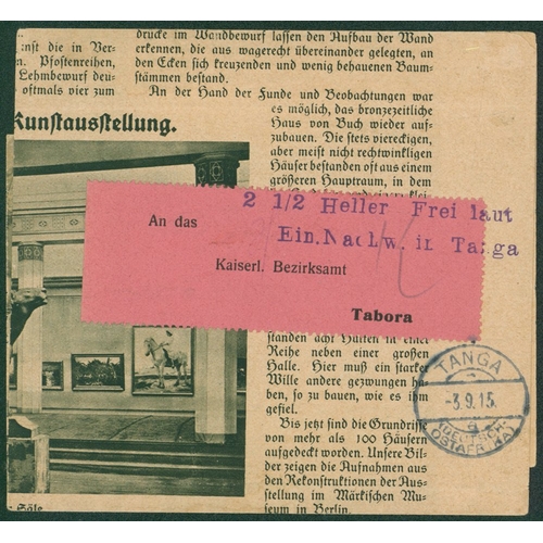 559 - GERMAN EAST AFRICA 1915 homemade wrapper with pink label addressed to Tabora, the label cancelled vi... 