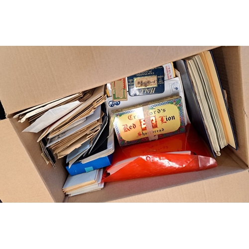 138 - MISCELLANEOUS ACCUMULATION in a large carton with stamps on leaves, in Strand albums etc. in envelop... 