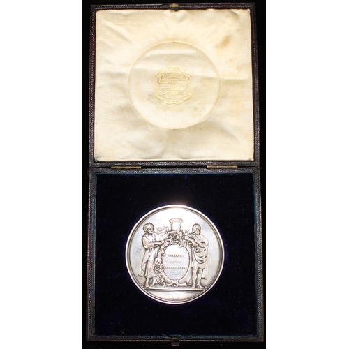 601 - THE PHARMACEUTICAL SOCIETY OF GREAT BRITAIN, founded 1852, a heavy silver award medal, presented in ... 