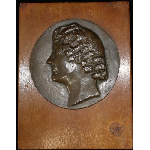 689 - HUNGARY: K?ROLY CSERNA (1867-1944), a circular bas-relief medallic portrait of a woman, her profile ... 