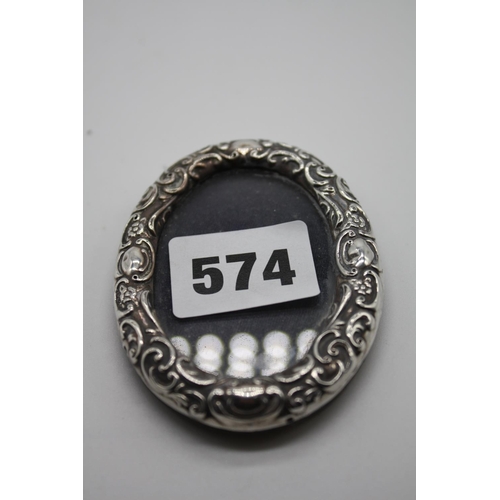 574 - Oval embossed silver photo frame 3