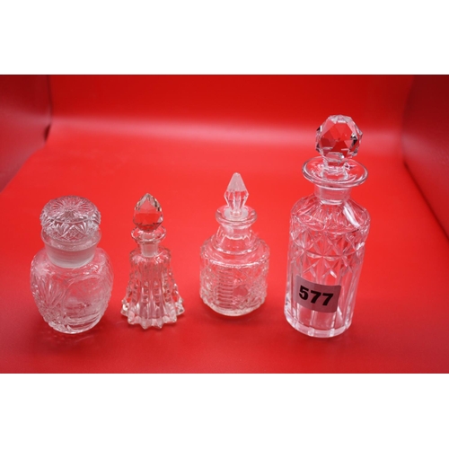 577 - 4 assorted glass scent bottle- tallest 5 1/2