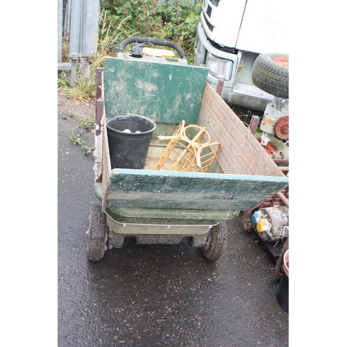 21. l - Electric battery powered wheelbarrow charger present
(untried or tested)