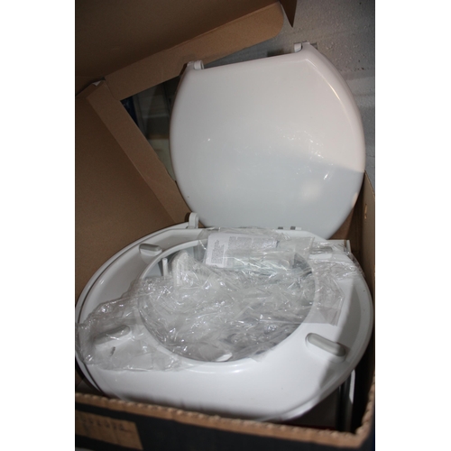 393 - 3 new plastic toilet seats