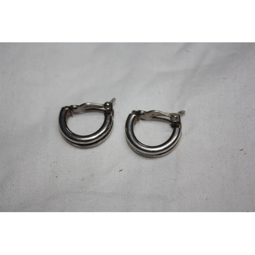 1064 - Pair clip on silver earrings