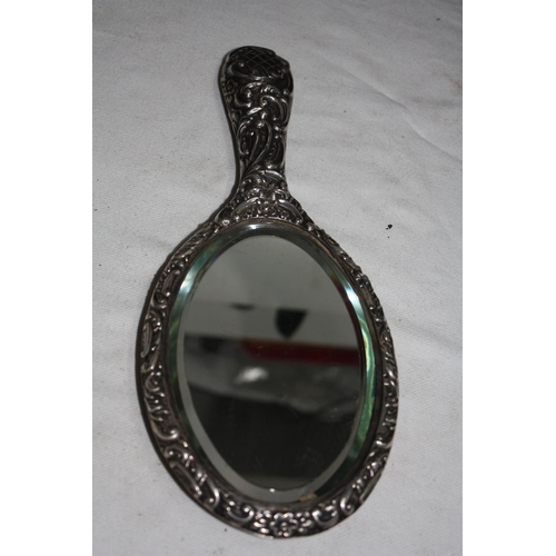 1189 - Embossed silver hand mirror