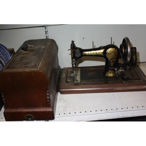 1449 - Jones cased sewing machine