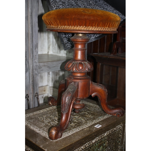 1486 - Swivel topped rise & fall piano stool 21