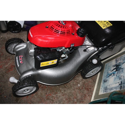 212a - Honda GCB160 petrol mower, stored in garage for a year-now non starter but very clean