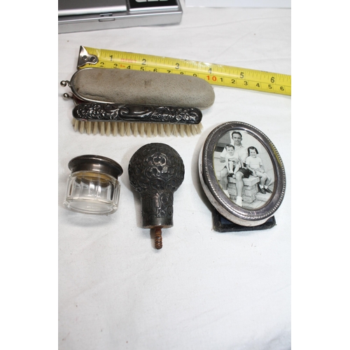 1232 - Silver backed nail brush, miniature photo frame, Mappin & Webb patch pot & white metal cane handle