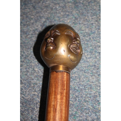 1435 - 4 faced head walking stick 36