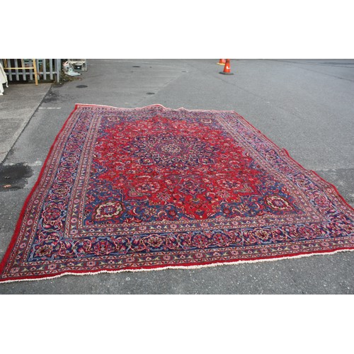 1900 - Large Persian red ground carpet 294 x 400 cm