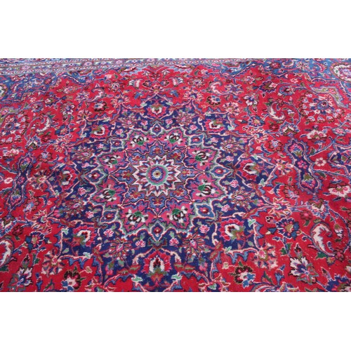 1900 - Large Persian red ground carpet 294 x 400 cm