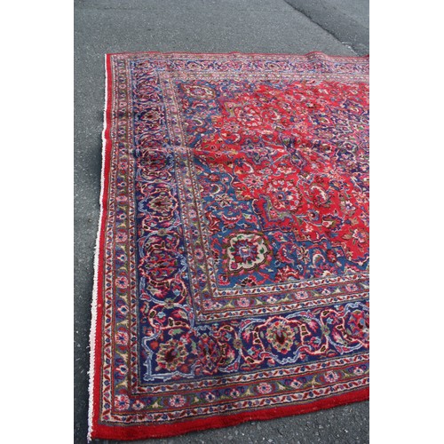 1900 - Large Persian red ground carpet 294 x 400 cm