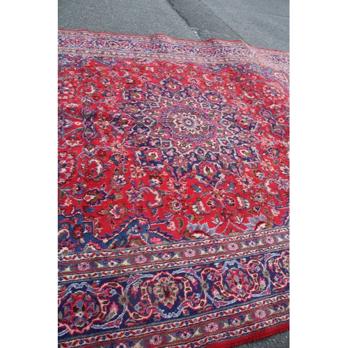 1900 - Large Persian red ground carpet 294 x 400 cm