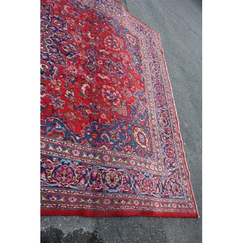 1900 - Large Persian red ground carpet 294 x 400 cm