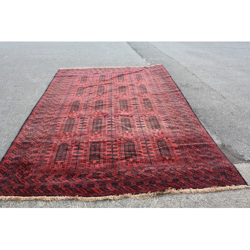 1902 - Red ground rug with 20 repeat motifs 2 metre 10 x 3 metre 40