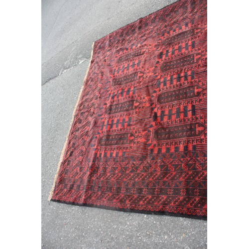 1902 - Red ground rug with 20 repeat motifs 2 metre 10 x 3 metre 40