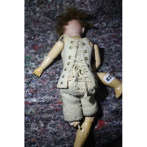 837 - Porcelain headed doll  marked Made in Germany 390 A.O.M - hairline crack from below ear to bottom of... 