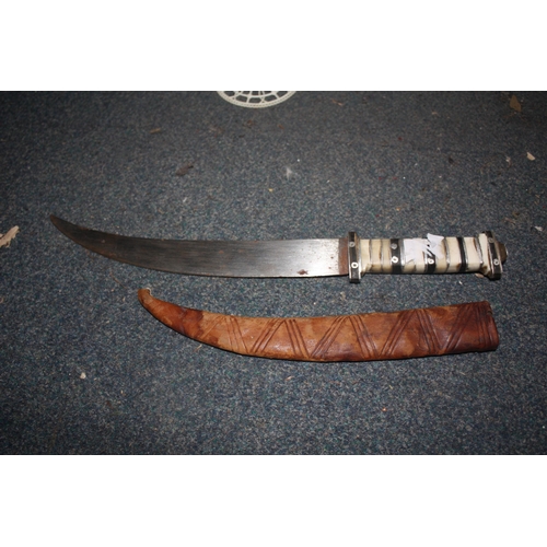 1094 - Dagger in sheath 14 1/2