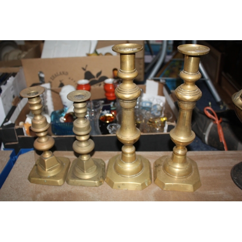 1143 - 2 pairs brass candlesticks- tallest 12 1/2