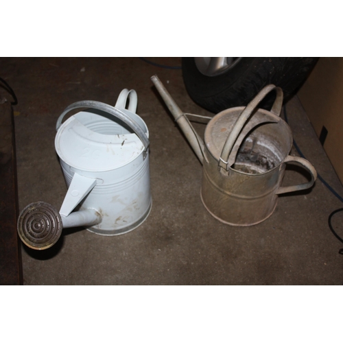 229 - Galvanised watering can & tin watering can with rose