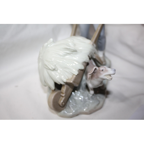 537 - Lladro figure boy with wheelbarrow 9