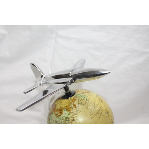 630 - Chromed airoplane globe 12