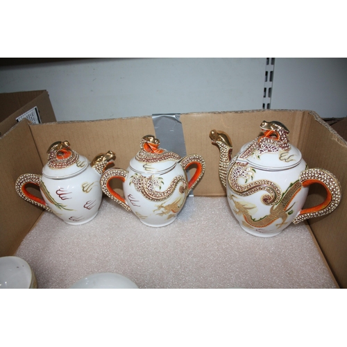 757 - Japanese eggshell china decorative tea set with ladies faces in base of cups