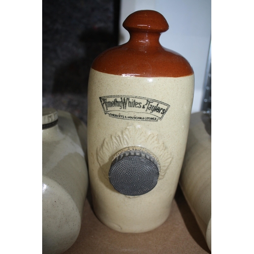 784 - 3 stoneware hot water bottles