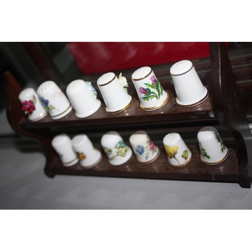 939 - Miniature shelf thimbles