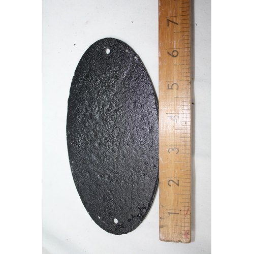 994 - Oval iron sign