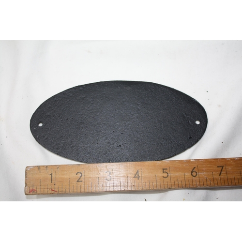 995 - Oval iron sign